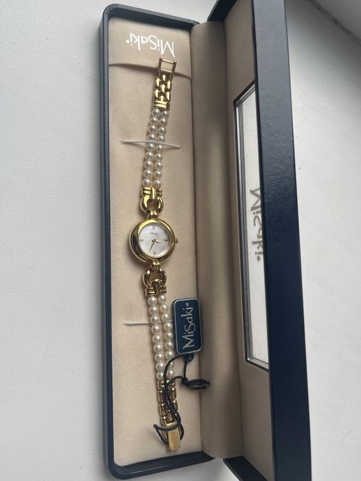 Часы с жемчугом и позолотой