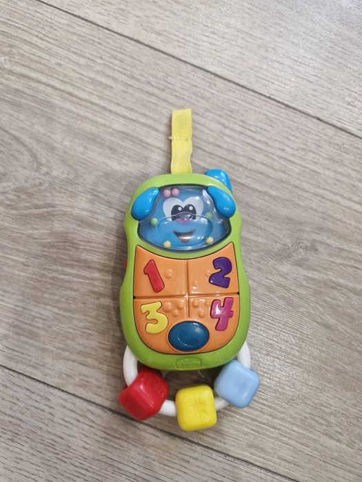 Іграшка-брязкальце музична Chicco Puppy Phone , б/в