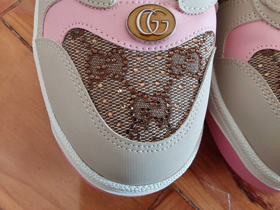 Sapatilhas Gucci.