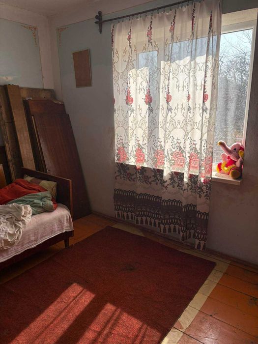 Житловий будинок та земельна ділянка 25 сот. смт. Добротвір