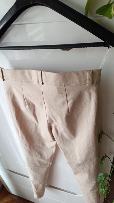 Spodnie by me woskowane złote guziki zamki beż