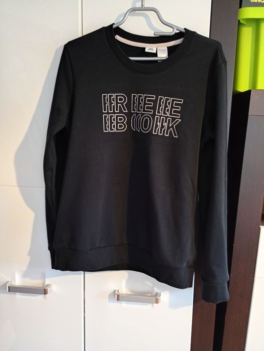 Czarny sweter męski.Reebok