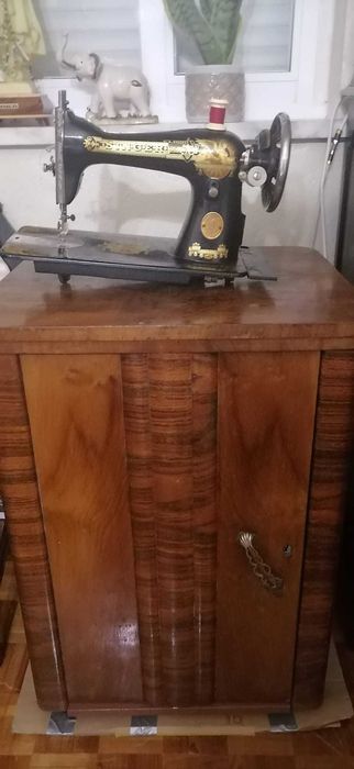 Maquina de costura singer
