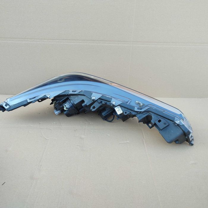 Toyota Corolla XII E21 kombi HB lampa lewa reflektor oryginał EU