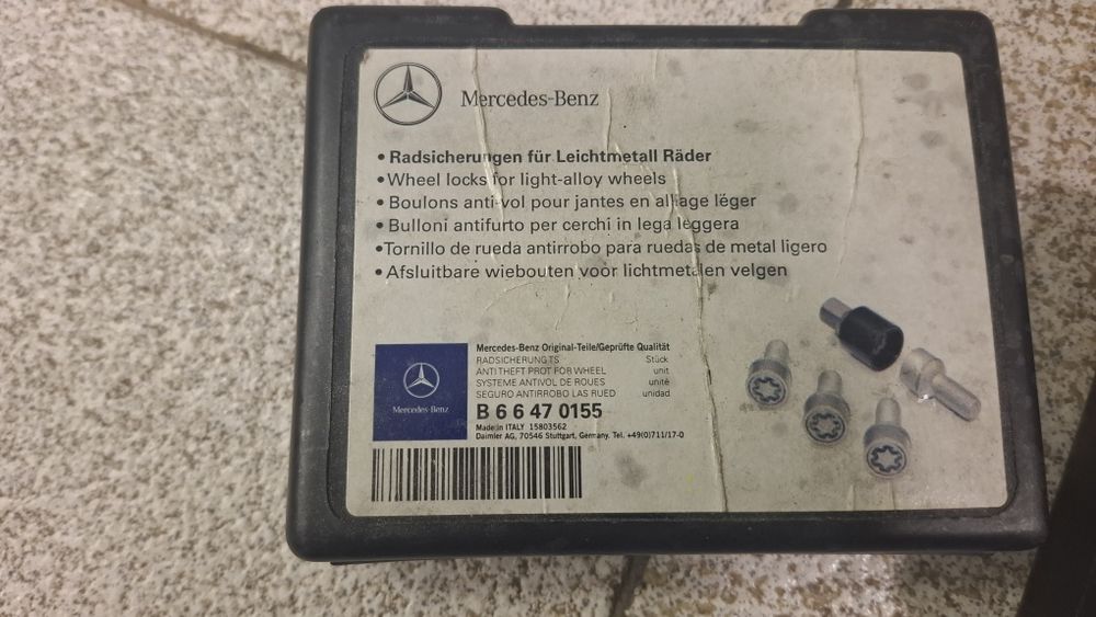 Tapete de consola Discovery 200 TDI e porcas de seguranca