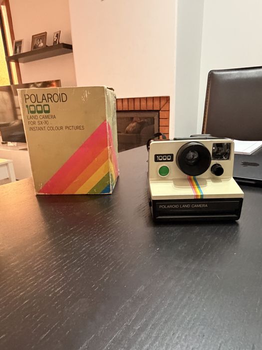 Maquina fotografica Polaroid 1000 a funcionar