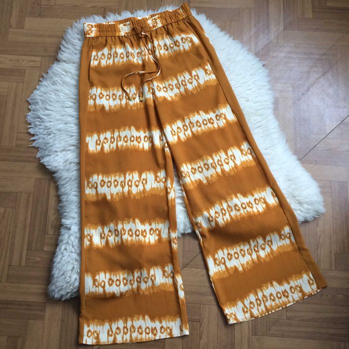 H&M spodnie palazzo musztardowe miodowe tie dye letnie boho L 40