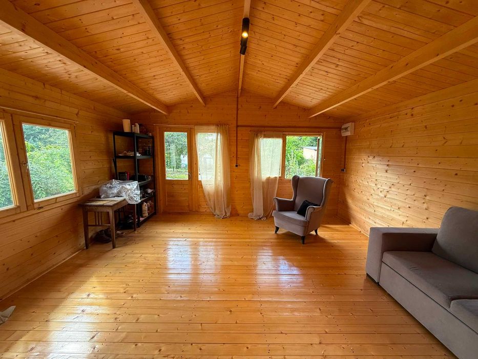 Działka ROD 200 m² z nowym drewnianym domkiem, prąd, woda, kostka, ogrodzenie