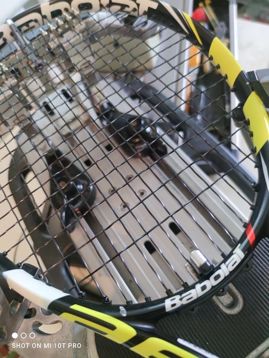 Професійна перетяжка, натяжка  ракеток для тенісу, бадмінтону,сквошу,