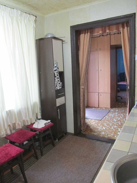 Продам  будинок по вул. В.Скринника (р-н пл.Покровської) або обміняю на 1-2 кімнатну квартиру