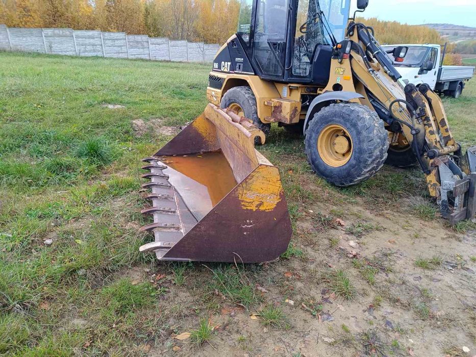 Фронтальний навантажувач CAT 906