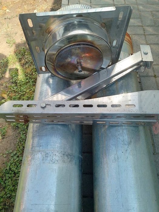 Продам твердопаливний котел потужністю 16 кВт разом з димохідним трубами