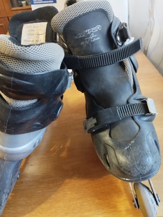 Ролики черного цвета.4 колесные.  Раздвижные 34 - 37 размер. Б/У