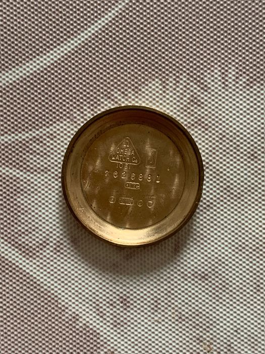 Годинник, золотий омега