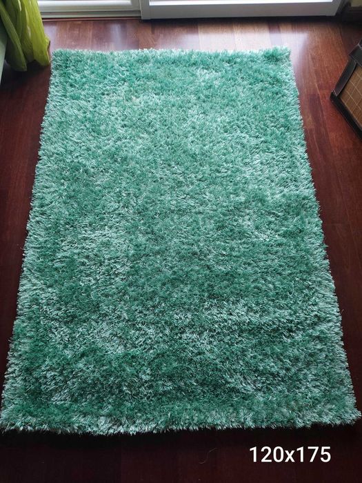 Tapete verde pouco usado