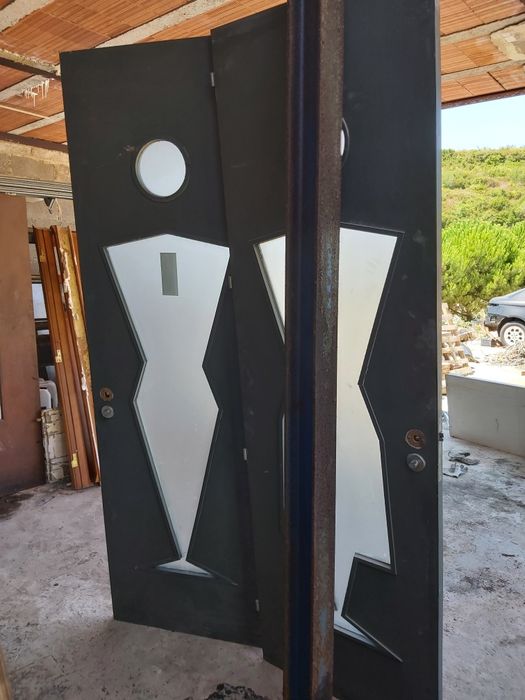 Portas de  WC masculino e feminino