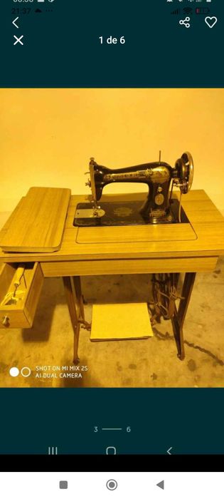 Máquina de costura singer