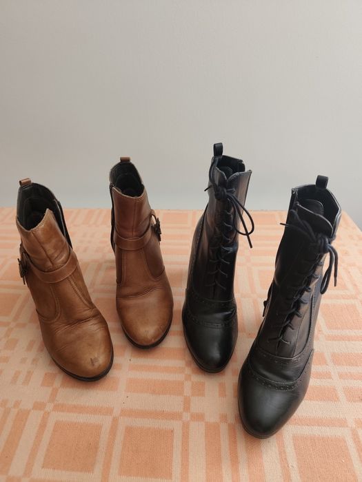 Botas curtas pretas e castanhas
