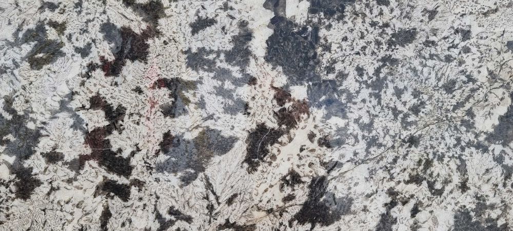 Граніт Aspen White в блоках.