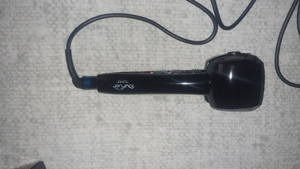 Modelador de cabelo automático
