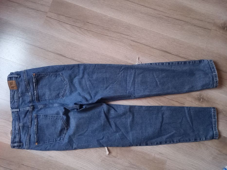 ASpodnie jeans Denim Sinsay roz 42 XL z rozdarciami