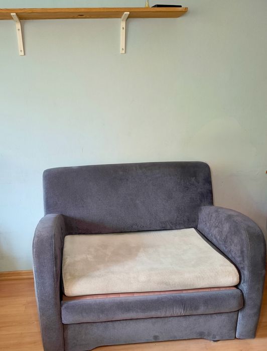 Fotel - łóżko rozsuwany z pojemnikiem