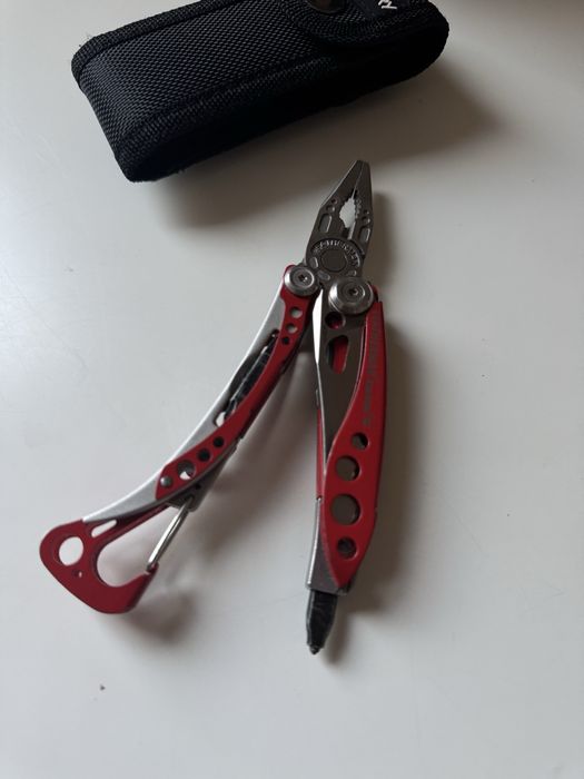 Leatherman Skeletool RX + bit do bicia szyb + kabura
