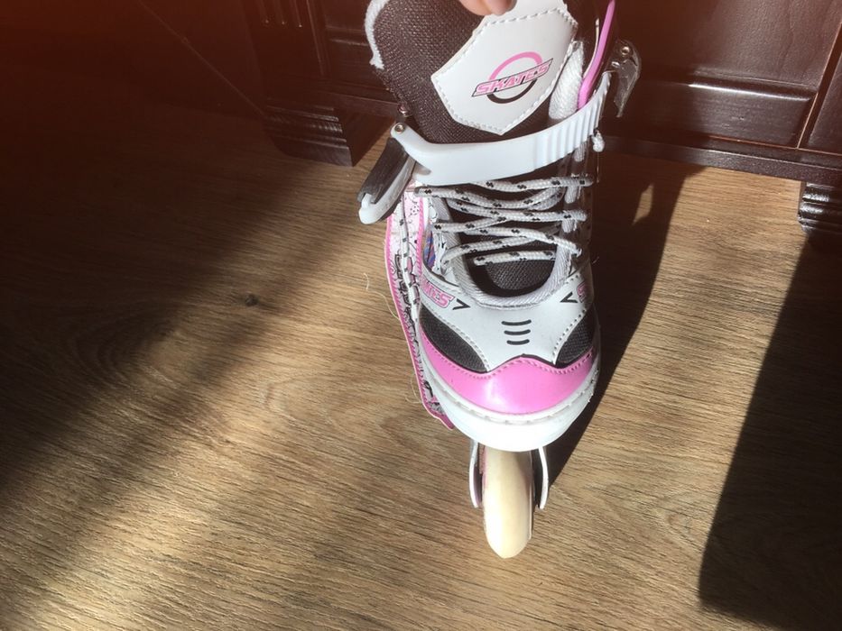 Роликовые коньки