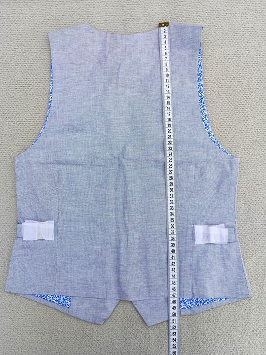 Піджаки, жилетки, кофтинки, гортайте фото