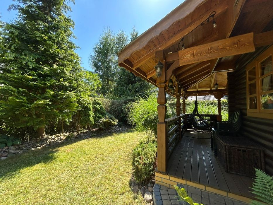 Domek nad Jeziorem Piaseczno Chata Soła, kominek taras