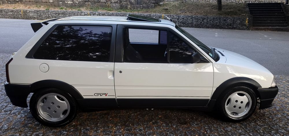 Ax GTi bom estado  teto pele