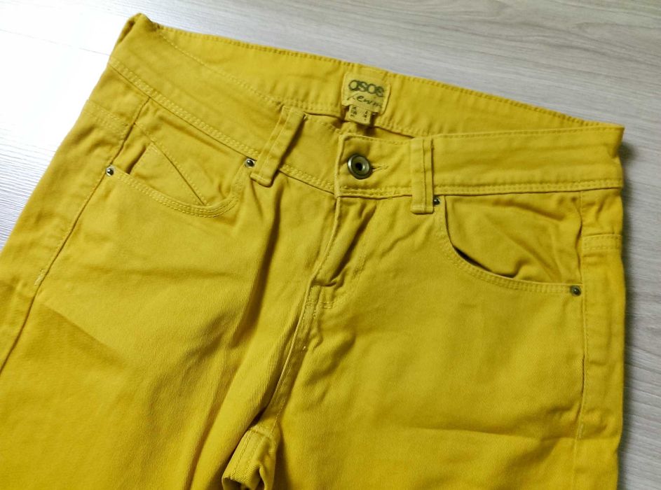 Damskie spodnie jeansy żółte musztardowe rozciągliwe Asos 36