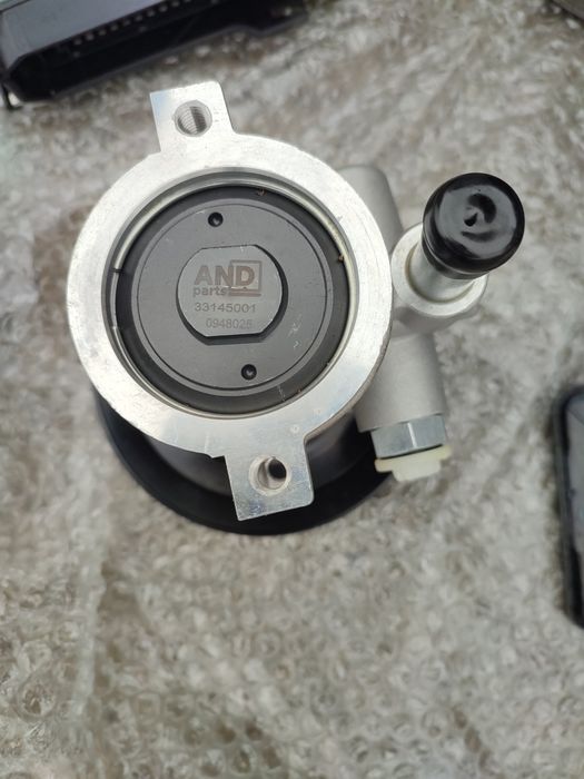 Насос ГУР AND 33145001 "Opel Omega A"