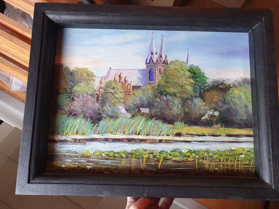 Obraz olejny w czarnej ramie