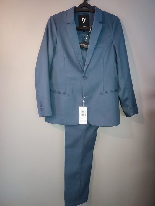 Garnitur 164 Reporter young