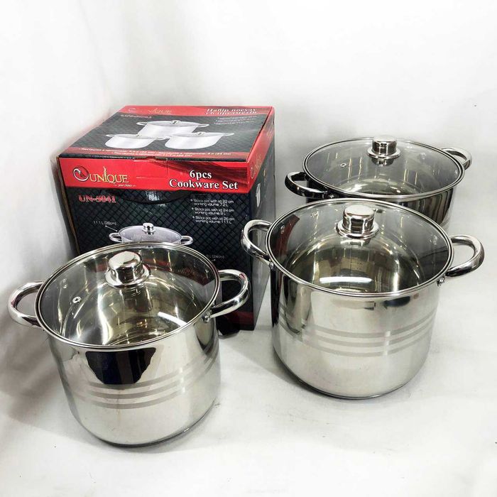 Набір великих каструль з нержавіючої сталі  з кришками.