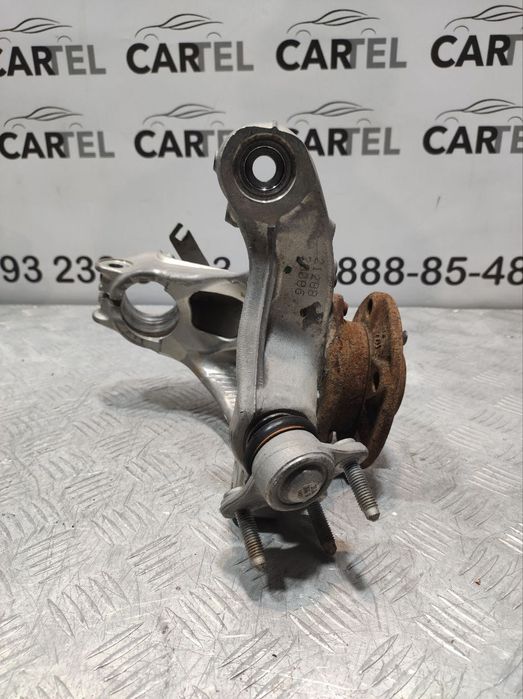 Поворотний кулак (Цапфа) передній правий VW Tiguan