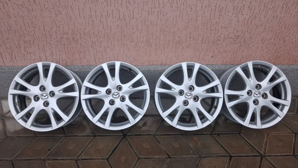 Оригінальні диски титани Mazda 2 4/100R16