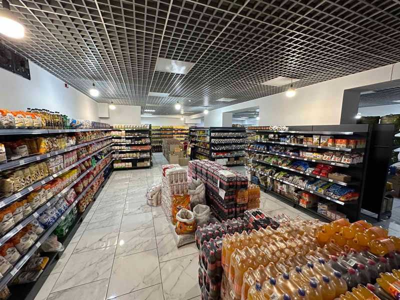 Стелажі металеві для магазинів. Торговельне обладнання для одягу.