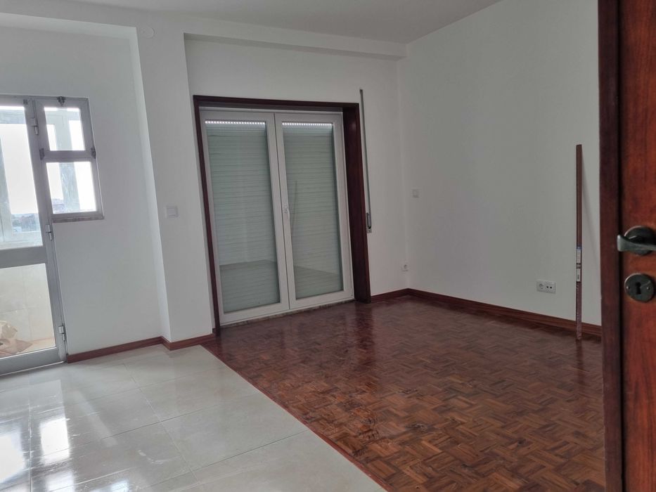 Quarto junto ao glicínias
