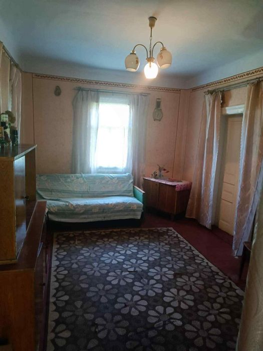 Продам дерев'яний будинок у с. Попелі.