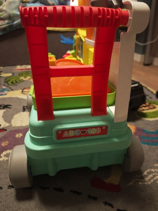 Fisher Price Wesoły Kamper Malucha pchacz jeździk grający