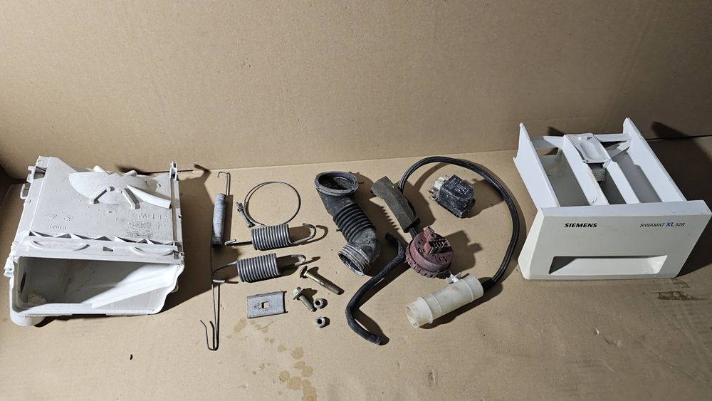 Części zamienne do pralki Siemens Siwamat XL 528 sprężyna wąż szuflada