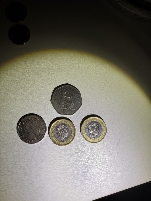 Монети фунти стерлінги сінгапур гонг конг емірати