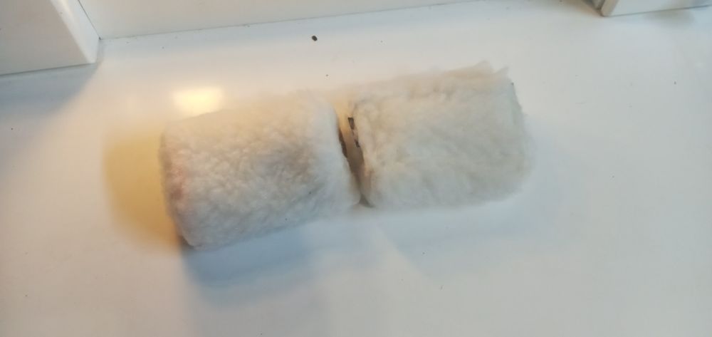 Накладки  с меха на ручку коляски,санок,велосипеда