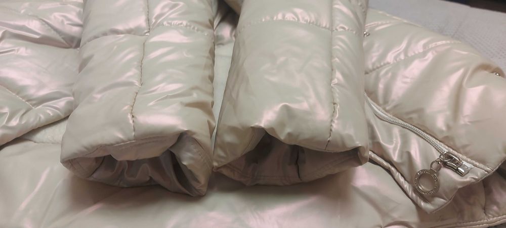 Пуховик на зріст 140