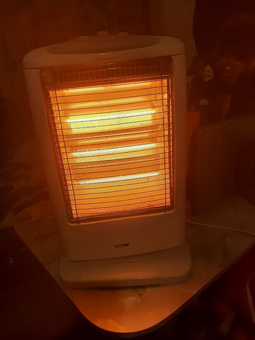 Электрообогреватель галогеновый б/у .