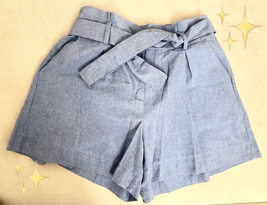 Блакитний льняний костюм