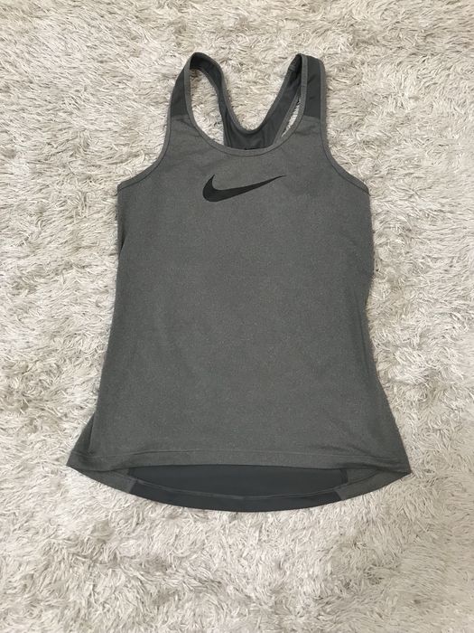 Жіночі спортивні футболки,майки  Nike,Puma,Adidas,Reebok
