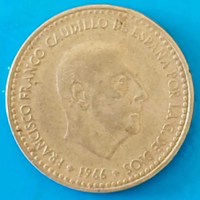 Una Peseta de 1966 com *69* na estrela, Espanha